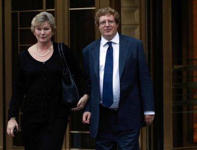 Guy Hands (R) of Terra Firma Capital Partners exits Manhattan Federal Court with his wife Julia in New York October 26, 2010. REUTERS/Brenda Guy Hands (R) of Terra Firma Capital Partners exits Manhattan Federal Court with his wife Julia in New York October 26, 2010. REUTERS/Brenda