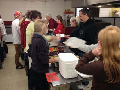 Members of the Elkhart Lake-Glenbeulah FCCLA serve a Thanksgiving meal they cooked to students and senior citizens. Members of the Elkhart Lake-Glenbeulah FCCLA serve a Thanksgiving meal they cooked to students and senior citizens.