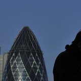 A worker smokes a cigar in the City of London February 9, 2011. REUTERS/Toby Melville A worker smokes a cigar in the City of London February 9, 2011. REUTERS/Toby Melville