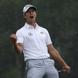 Adam Scott of Australia celebrates sinking a birdie putt on the 18th green during the final round in the 2013 Masters golf tournament at the Adam Scott of Australia celebrates sinking a birdie putt on the 18th green during the final round in the 2013 Masters golf tournament at the