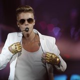 Canadian singer Justin Bieber performs in a concert at the Atlantico pavilion in Lisbon March 11, 2013. REUTERS/Hugo Correia Canadian singer Justin Bieber performs in a concert at the Atlantico pavilion in Lisbon March 11, 2013. REUTERS/Hugo Correia