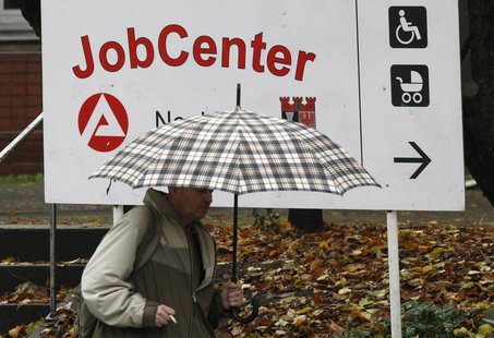 A man walks in front of a job centre in Berlin, October 30, 2008. REUTERS/Fabrizio Bensch A man walks in front of a job centre in Berlin, October 30, 2008. REUTERS/Fabrizio Bensch