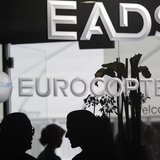 Visitors talk near the welcome desk of the EADS booth at the ILA Berlin Air Show in Selchow near Schoenefeld south of Berlin on September 13 Visitors talk near the welcome desk of the EADS booth at the ILA Berlin Air Show in Selchow near Schoenefeld south of Berlin on September 13