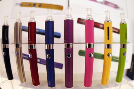 A window display with different colour models electronic cigarettes is seen in a shop in Paris October 8, 2013. REUTERS/Charles Platiau A window display with different colour models electronic cigarettes is seen in a shop in Paris October 8, 2013. REUTERS/Charles Platiau