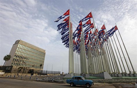 A car drives past the building of the the U.S. diplomatic mission in Cuba, The U.S. Interests Section, (USINT), in Havana, in this September A car drives past the building of the the U.S. diplomatic mission in Cuba, The U.S. Interests Section, (USINT), in Havana, in this September