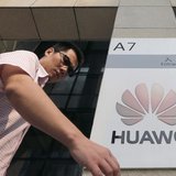 A man walks past a Huawei company logo outside the entrance of a Huawei office in Wuhan, Hubei province, October 9, 2012. REUTERS/Stringer A man walks past a Huawei company logo outside the entrance of a Huawei office in Wuhan, Hubei province, October 9, 2012. REUTERS/Stringer