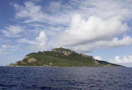 A group of disputed islands known as Senkaku in Japan and Diaoyu in China is seen from the city government of Tokyo's survey vessel in the E A group of disputed islands known as Senkaku in Japan and Diaoyu in China is seen from the city government of Tokyo's survey vessel in the E
