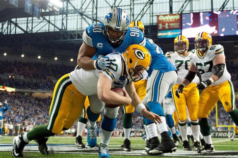 Detroit Lions defensive tackle Ndamukong Suh (90) sacks Green Bay Packers quarterback Matt Flynn (10) in the end zone for a safety during th Detroit Lions defensive tackle Ndamukong Suh (90) sacks Green Bay Packers quarterback Matt Flynn (10) in the end zone for a safety during th