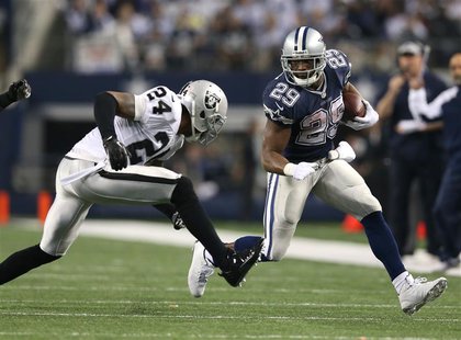 Nov 28, 2013; Arlington, TX, USA; Dallas Cowboys running back DeMarco Murray (29) runs with the ball in the fourth quarter against Oakland R Nov 28, 2013; Arlington, TX, USA; Dallas Cowboys running back DeMarco Murray (29) runs with the ball in the fourth quarter against Oakland R