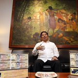 Philippines Central Bank Governor Amando Tetangco gestures during an interview at the central bank headquarters in Manila July 30, 2013. REU Philippines Central Bank Governor Amando Tetangco gestures during an interview at the central bank headquarters in Manila July 30, 2013. REU