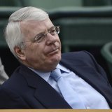 Former British Prime Minister, John Major, sits on Centre Court for the men's singles tennis match between Novak Djokovic of Serbia and Rade Former British Prime Minister, John Major, sits on Centre Court for the men's singles tennis match between Novak Djokovic of Serbia and Rade