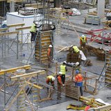 Workers are seen at a construction site of a building which will house apartments and offices in central Brussels November 26, 2013. REUTERS Workers are seen at a construction site of a building which will house apartments and offices in central Brussels November 26, 2013. REUTERS