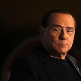 Former Prime Minister Silvio Berlusconi looks on during a speech from the stage in downtown Rome November 27, 2013. REUTERS/Alessandro Bianc Former Prime Minister Silvio Berlusconi looks on during a speech from the stage in downtown Rome November 27, 2013. REUTERS/Alessandro Bianc