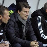 Swansea's manager Michael Laudrup (C) during their Europa League soccer match against Valencia at the Liberty Stadium in Swansea, Wales, Nov Swansea's manager Michael Laudrup (C) during their Europa League soccer match against Valencia at the Liberty Stadium in Swansea, Wales, Nov