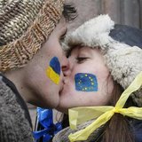 Students kiss as they stand on a street to form a human chain from the Ukrainian capital to the western border during a demonstration in sup Students kiss as they stand on a street to form a human chain from the Ukrainian capital to the western border during a demonstration in sup