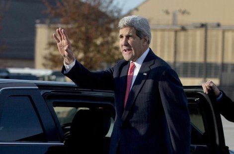 U.S. Secretary of State John Kerry waves before getting into his motorcade vehicle as he arrives at Andrews Air Force Base, Maryland, Novemb U.S. Secretary of State John Kerry waves before getting into his motorcade vehicle as he arrives at Andrews Air Force Base, Maryland, Novemb