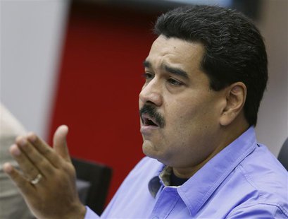 Venezuela's President Nicolas Maduro talks during a Council of Ministers meeting at Miraflores Palace in Caracas November 29, 2013. REUTERS/ Venezuela's President Nicolas Maduro talks during a Council of Ministers meeting at Miraflores Palace in Caracas November 29, 2013. REUTERS/