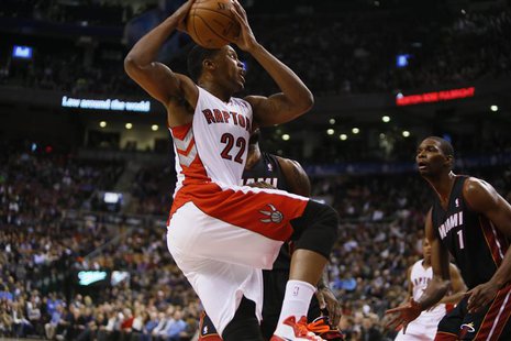 Nov 29, 2013; Toronto, Ontario, CAN; Toronto Raptors forward Rudy Gay (22) goes up to shoot as Miami Heat center-forward Chris Bosh (1) look Nov 29, 2013; Toronto, Ontario, CAN; Toronto Raptors forward Rudy Gay (22) goes up to shoot as Miami Heat center-forward Chris Bosh (1) look