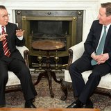Li Changchun, a member of China's Standing Committee of the Political Bureau (L) speaks to Britain's Prime Minister David Cameron during the Li Changchun, a member of China's Standing Committee of the Political Bureau (L) speaks to Britain's Prime Minister David Cameron during the