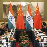 China's President Xi Jinping (R) talks with India's Prime Minister Manmohan Singh (L) during a meeting at the Diaoyutai State Guesthouse in China's President Xi Jinping (R) talks with India's Prime Minister Manmohan Singh (L) during a meeting at the Diaoyutai State Guesthouse in