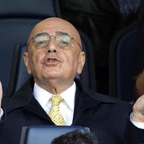 AC Milan's vice president Adriano Galliani gestures as he arrives to watch their Italian Serie A soccer match against Chievo Verona at the B AC Milan's vice president Adriano Galliani gestures as he arrives to watch their Italian Serie A soccer match against Chievo Verona at the B