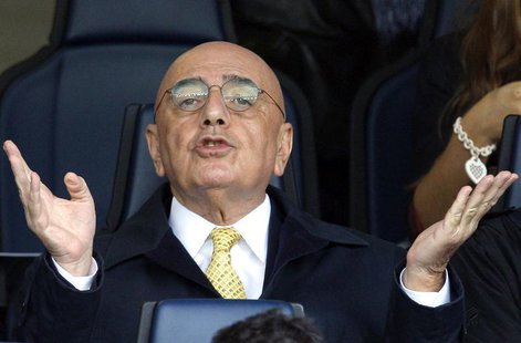 AC Milan's vice president Adriano Galliani gestures as he arrives to watch their Italian Serie A soccer match against Chievo Verona at the B AC Milan's vice president Adriano Galliani gestures as he arrives to watch their Italian Serie A soccer match against Chievo Verona at the B