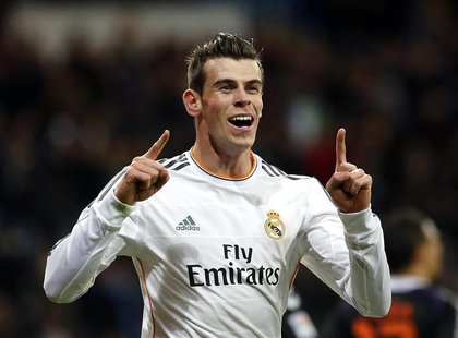 Real Madrid's Gareth Bale celebrates his goal against Real Valladolid during their Spanish First Division soccer match at Santiago Bernabeu Real Madrid's Gareth Bale celebrates his goal against Real Valladolid during their Spanish First Division soccer match at Santiago Bernabeu