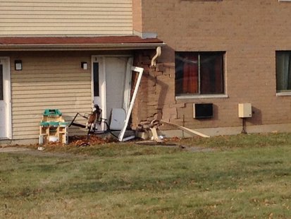 Damage to Green Bay apartment building where teenager slammed his pickup truck into on Nov. 30, 2013. (Photo from: FOX 11). Damage to Green Bay apartment building where teenager slammed his pickup truck into on Nov. 30, 2013. (Photo from: FOX 11).