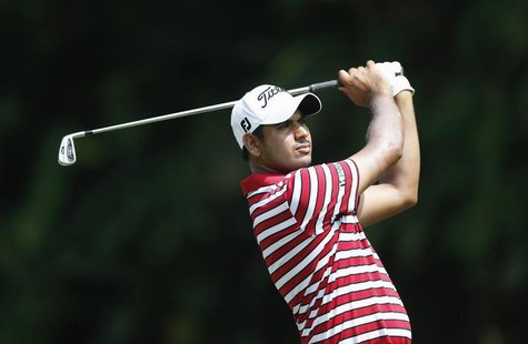 Gaganjeet Bhullar of India watches his shot on the first hole during the Malaysia's Asia Pacific Classic golf tournament in Kuala Lumpur Oct Gaganjeet Bhullar of India watches his shot on the first hole during the Malaysia's Asia Pacific Classic golf tournament in Kuala Lumpur Oct