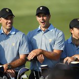 International Team player Adam Scott, of Australia, yawns as he poses for a team picture between Charl Schwartzel (L) and Richard Sterne (R) International Team player Adam Scott, of Australia, yawns as he poses for a team picture between Charl Schwartzel (L) and Richard Sterne (R)