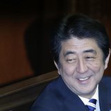 Japan's Prime Minister Shinzo Abe smiles during the Lower House plenary session of the parliament in Tokyo November 26, 2013. REUTERS/Toru H Japan's Prime Minister Shinzo Abe smiles during the Lower House plenary session of the parliament in Tokyo November 26, 2013. REUTERS/Toru H