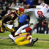 Dec 1, 2013; Landover, MD, USA; New York Giants wide receiver Hakeem Nicks (88) is tackled by Washington Redskins safety Brandon Meriweather Dec 1, 2013; Landover, MD, USA; New York Giants wide receiver Hakeem Nicks (88) is tackled by Washington Redskins safety Brandon Meriweather