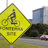 The Fonterra Te Rapa plant is seen behind a sign board for cyclists near Hamilton, August 6, 2013. REUTERS/Nigel Marple The Fonterra Te Rapa plant is seen behind a sign board for cyclists near Hamilton, August 6, 2013. REUTERS/Nigel Marple