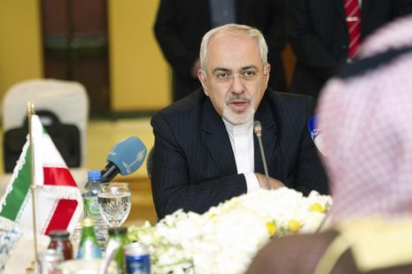 Iran's Foreign Minister Mohammad Javad Zarif speaks with Kuwait's Minister of Foreign Affairs Sheikh Sabah al Khalid al Sabah during a worki Iran's Foreign Minister Mohammad Javad Zarif speaks with Kuwait's Minister of Foreign Affairs Sheikh Sabah al Khalid al Sabah during a worki