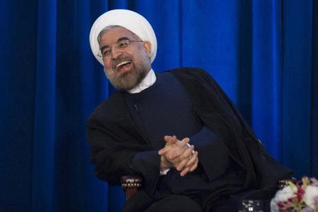 Iran's President Hassan Rouhani laughs as he speaks during an event hosted by the Council on Foreign Relations and the Asia Society in New Y Iran's President Hassan Rouhani laughs as he speaks during an event hosted by the Council on Foreign Relations and the Asia Society in New Y
