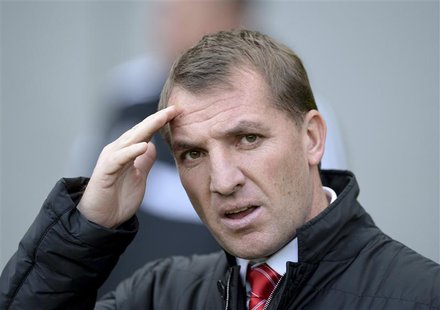 Liverpool manager Brendan Rodgers reacts before their English Premier League soccer match against Hull City at the KC stadium in Hull, north Liverpool manager Brendan Rodgers reacts before their English Premier League soccer match against Hull City at the KC stadium in Hull, north