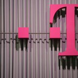 The logo of German company Deutsche Telekom is pictured at the CeBit computer fair in this file photo taken in Hanover, March, 6, 2012. REUT The logo of German company Deutsche Telekom is pictured at the CeBit computer fair in this file photo taken in Hanover, March, 6, 2012. REUT