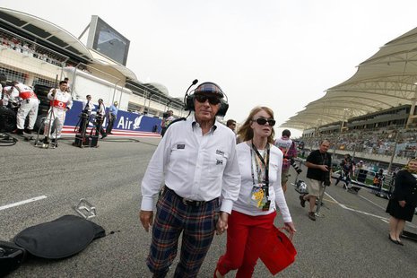 Former Formula One champion Sir Jackie Stewart walks in the grid with his wife Helen before the Bahrain F1 Grand Prix at the Sakhir circuit Former Formula One champion Sir Jackie Stewart walks in the grid with his wife Helen before the Bahrain F1 Grand Prix at the Sakhir circuit
