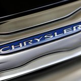 The Chrysler logo is shown on a new Chrysler 200 on the showroom at the Massey-Yardley Chrysler, Dodge, Jeep and Ram automobile dealership i The Chrysler logo is shown on a new Chrysler 200 on the showroom at the Massey-Yardley Chrysler, Dodge, Jeep and Ram automobile dealership i