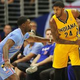 December 1, 2013; Los Angeles, CA, USA; Indiana Pacers small forward Paul George (24) controls the ball against the defense of Los Angeles C December 1, 2013; Los Angeles, CA, USA; Indiana Pacers small forward Paul George (24) controls the ball against the defense of Los Angeles C