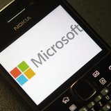 A photo illustration shows the Microsoft logo displayed on a Nokia phone in Vienna September 3, 2013. REUTERS/Heinz-Peter Bader A photo illustration shows the Microsoft logo displayed on a Nokia phone in Vienna September 3, 2013. REUTERS/Heinz-Peter Bader