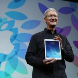Apple Inc CEO Tim Cook holds up the new iPad Air during an Apple event in San Francisco, California October 22, 2013. REUTERS/Robert Galbrai Apple Inc CEO Tim Cook holds up the new iPad Air during an Apple event in San Francisco, California October 22, 2013. REUTERS/Robert Galbrai