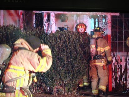 Crews respond to a house fire in Green Bay on December 1, 2013. (Photo from: FOX 11). Crews respond to a house fire in Green Bay on December 1, 2013. (Photo from: FOX 11).
