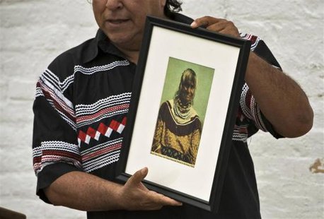 Seminole Tribe member and historian Willie Johns holds up a photograph of Polly Parker during a visit to Egmont Key State Park as part of a historic journey to retrace the "Voyage of Tears" in Egmont More...
CREDIT: REUTERS/STEVE NESIUS Seminole Tribe member and historian Willie Johns holds up a photograph of Polly Parker during a visit to Egmont Key State Park as part of a historic journey to retrace the "Voyage of Tears" in Egmont More...
CREDIT: REUTERS/STEVE NESIUS