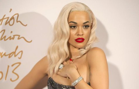British singer Rita Ora poses for photographs at the British Fashion Awards in London December 2, 2013. REUTERS/Neil Hall British singer Rita Ora poses for photographs at the British Fashion Awards in London December 2, 2013. REUTERS/Neil Hall
