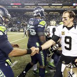 Dec 2, 2013; Seattle, WA, USA; Seattle Seahawks quarterback Russell Wilson (3) and New Orleans Saints quarterback Drew Brees (9) shake hands Dec 2, 2013; Seattle, WA, USA; Seattle Seahawks quarterback Russell Wilson (3) and New Orleans Saints quarterback Drew Brees (9) shake hands