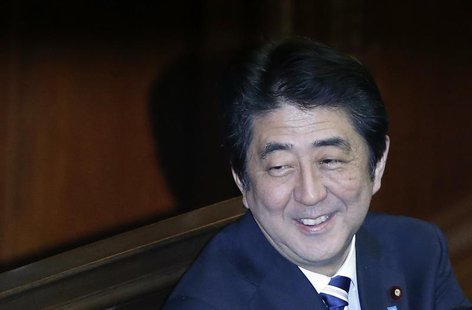 Japan's Prime Minister Shinzo Abe smiles during the Lower House plenary session of the parliament in Tokyo November 26, 2013. REUTERS/Toru H Japan's Prime Minister Shinzo Abe smiles during the Lower House plenary session of the parliament in Tokyo November 26, 2013. REUTERS/Toru H