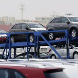 A truck transports cars made by South Korea's Hyundai Motor Group at the company's shipping yard at a port in Pyeongtaek, about 70 km (43 mi A truck transports cars made by South Korea's Hyundai Motor Group at the company's shipping yard at a port in Pyeongtaek, about 70 km (43 mi