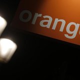 The logo of the Orange telecommunication and internet provider is seen on the facade of a store in Paris July 24, 2013. REUTERS/Christian Ha The logo of the Orange telecommunication and internet provider is seen on the facade of a store in Paris July 24, 2013. REUTERS/Christian Ha