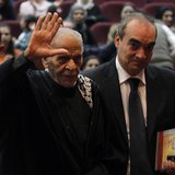 Egyptian poet Ahmed Fouad Negm (2nd R) waves upon his arrival to participate with the Palestinian folk Al Hanouneh troupe in Amman November Egyptian poet Ahmed Fouad Negm (2nd R) waves upon his arrival to participate with the Palestinian folk Al Hanouneh troupe in Amman November